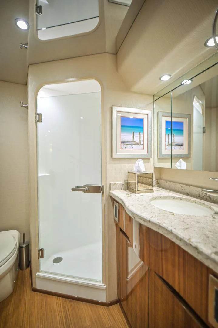 a bathroom with a white door aboard GALATI  TRADE Yacht for Sale