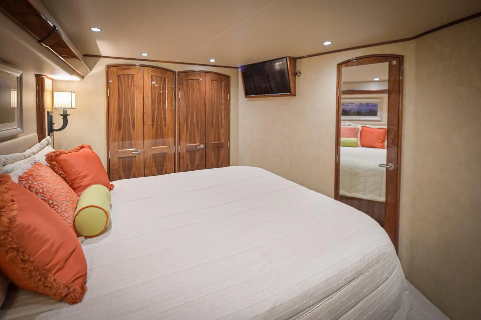 a bed with white sheets and pillows aboard GALATI  TRADE Yacht for Sale