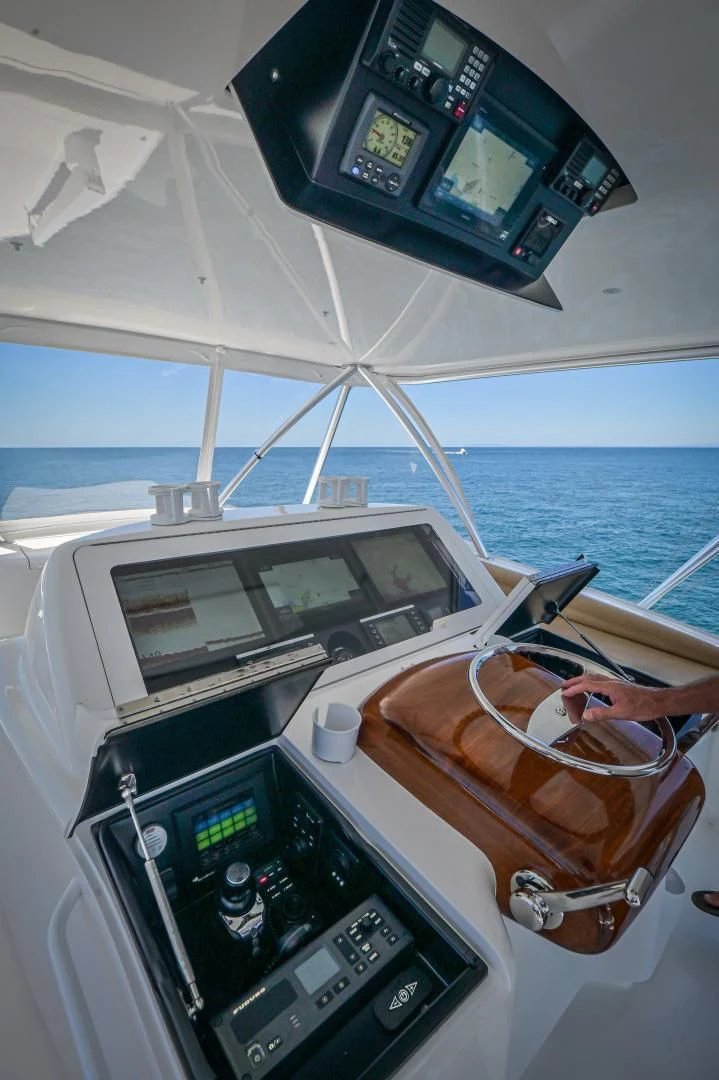 a boat with a seat and a steering wheel on the front aboard GALATI  TRADE Yacht for Sale