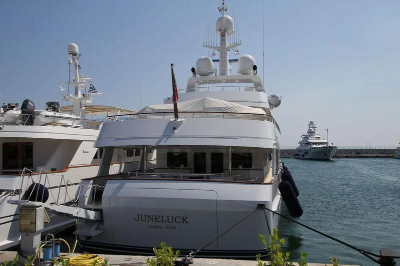a large white boat on a body of water aboard HALCYON Yacht for Sale