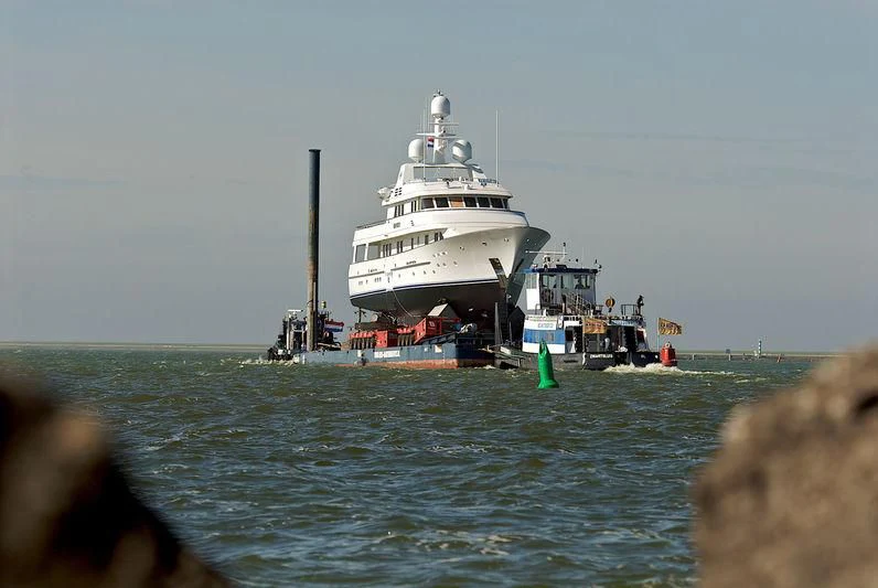 a large white ship in the water aboard HALCYON Yacht for Sale