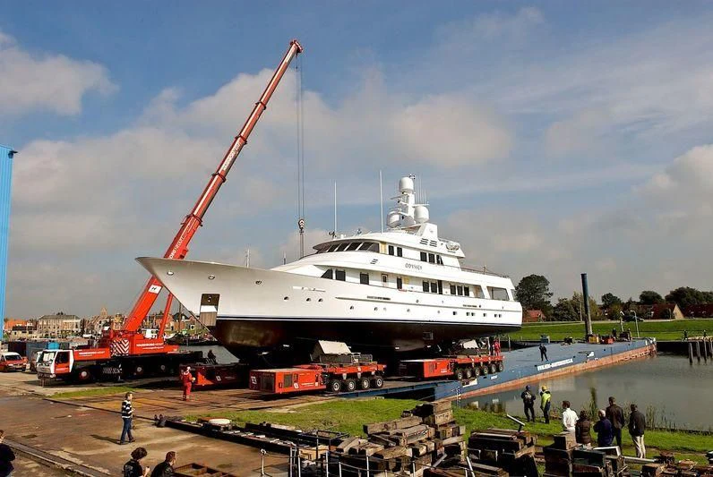 a boat being loaded with cargo aboard HALCYON Yacht for Sale