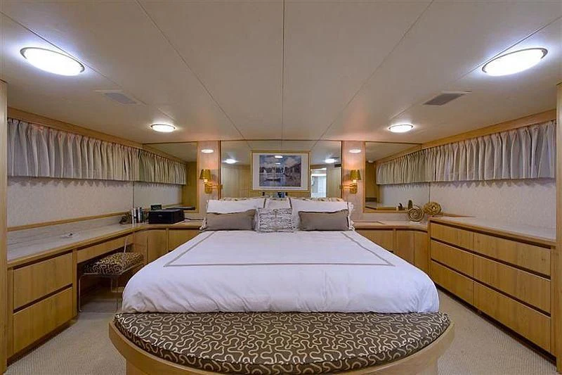 a room with a bed and a desk aboard SALLY JO II Yacht for Sale