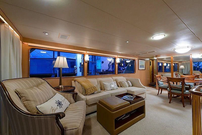 a living room with a couch and a tv aboard SALLY JO II Yacht for Sale