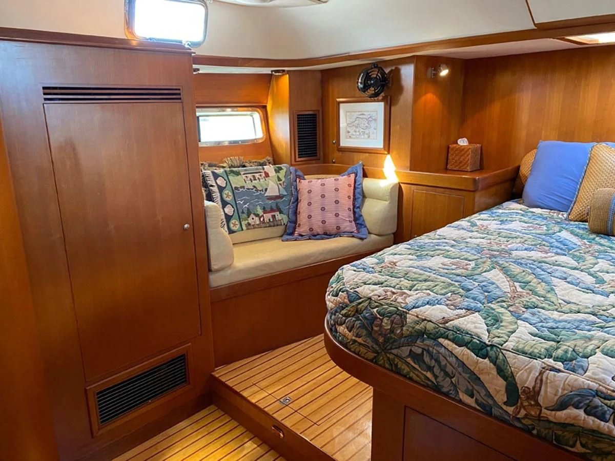 a room with two beds aboard EL CACIQUE Yacht for Sale