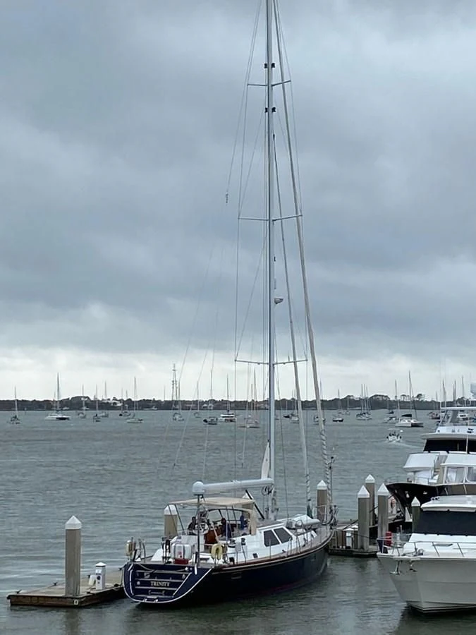 a boat is parked in the water aboard EL CACIQUE Yacht for Sale