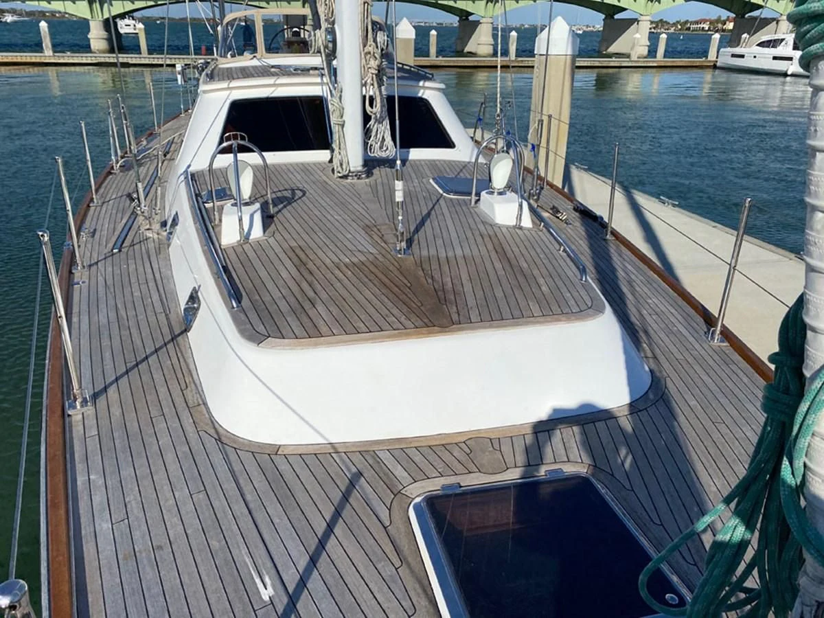 a boat on a dock aboard EL CACIQUE Yacht for Sale