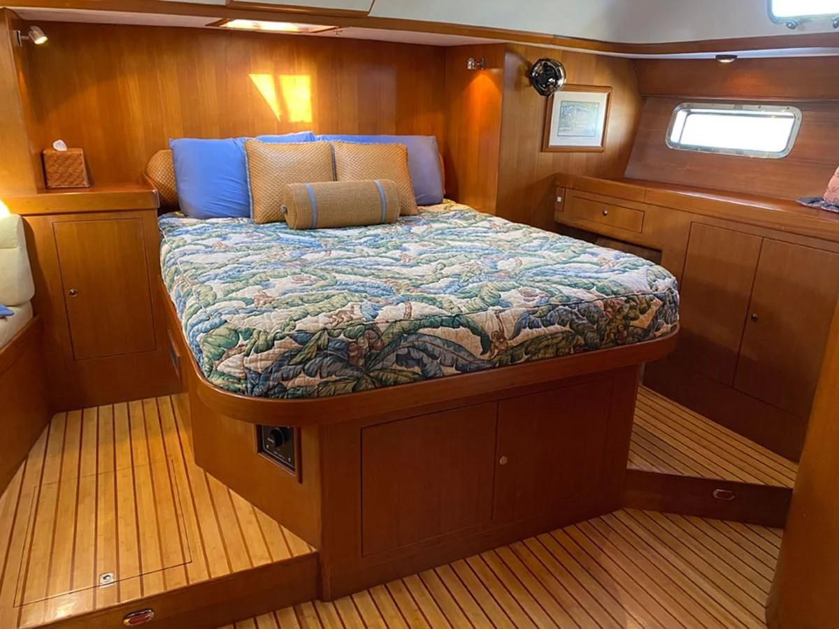 a bed in a room aboard EL CACIQUE Yacht for Sale