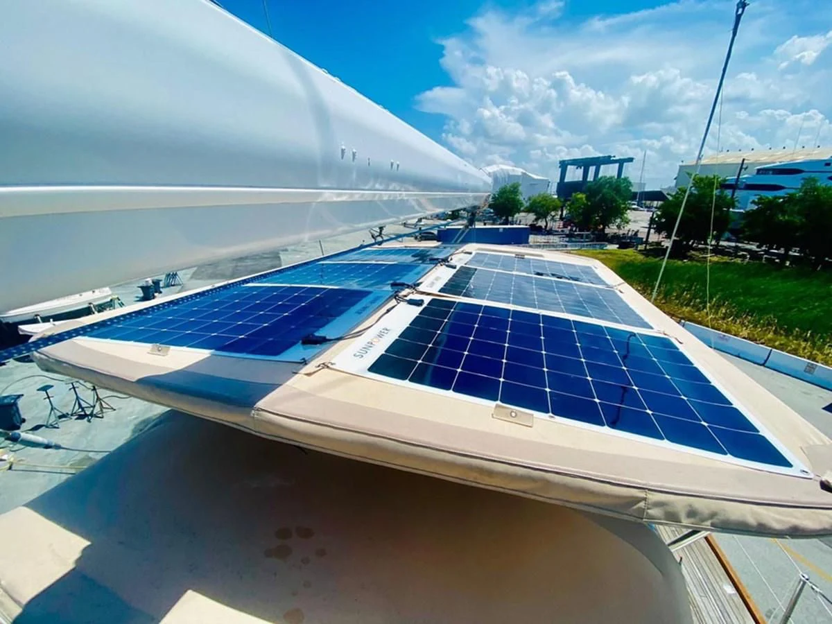 an airplane wing with a window aboard EL CACIQUE Yacht for Sale
