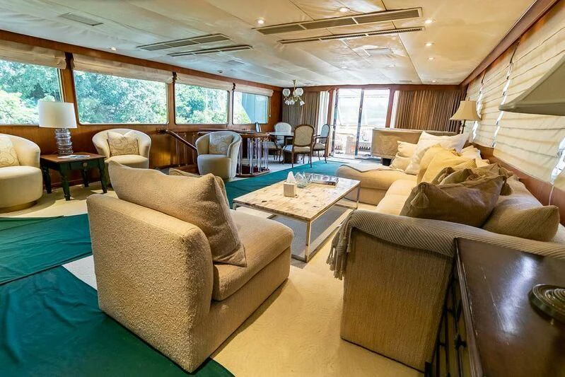 a living room with a large window aboard NEWS Yacht for Sale