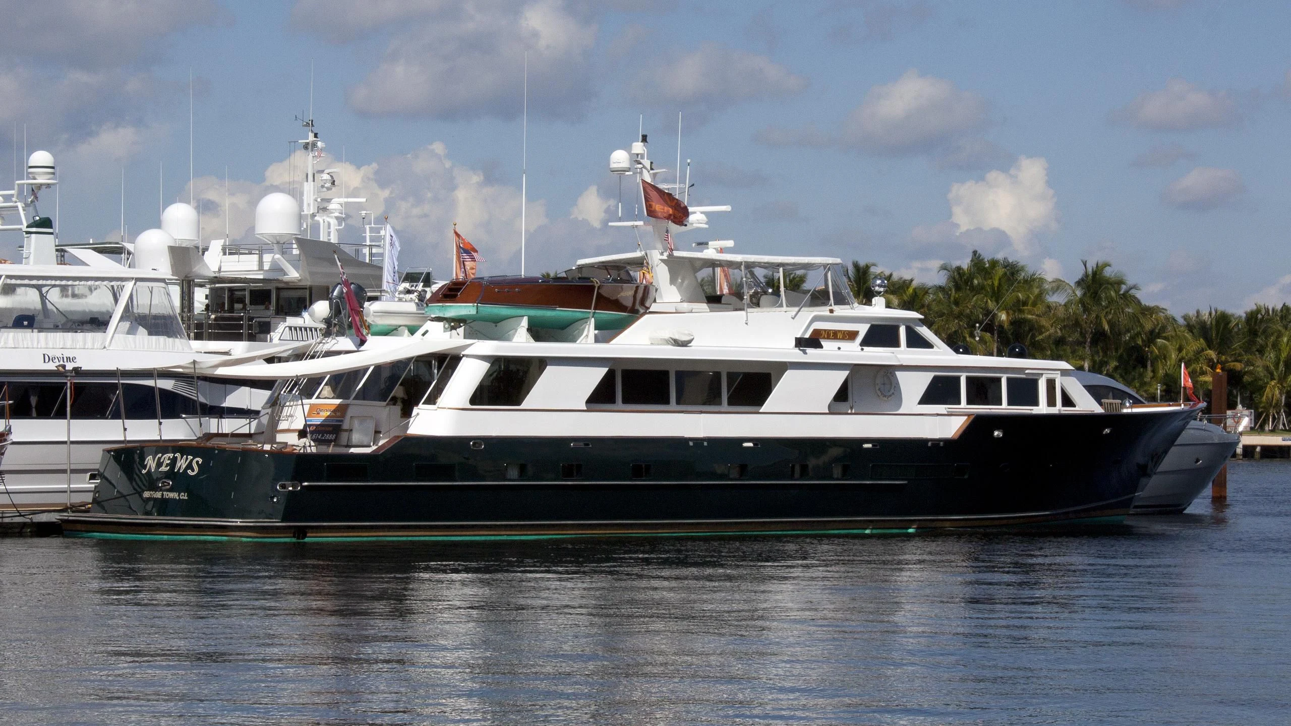 a couple of boats on the water aboard NEWS Yacht for Sale