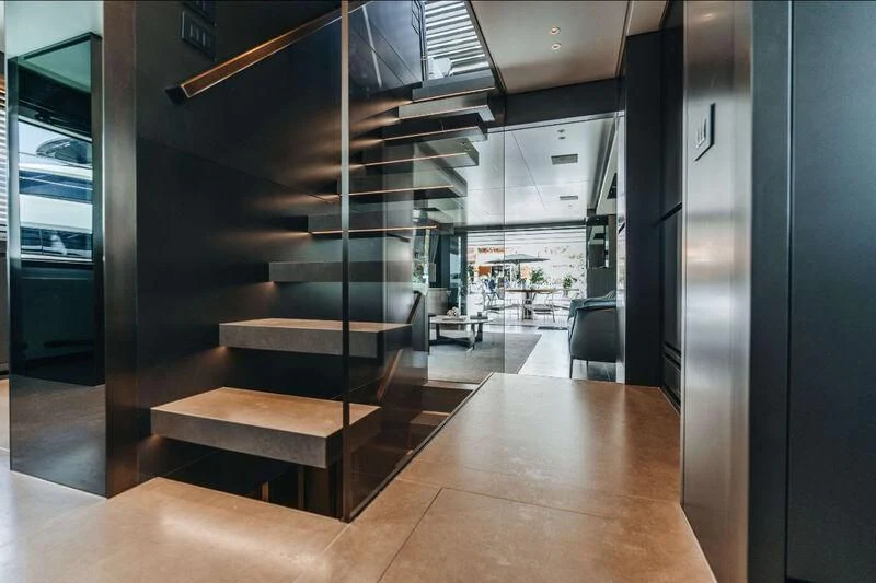 a room with a large glass wall aboard DRAGONFLY I Yacht for Sale