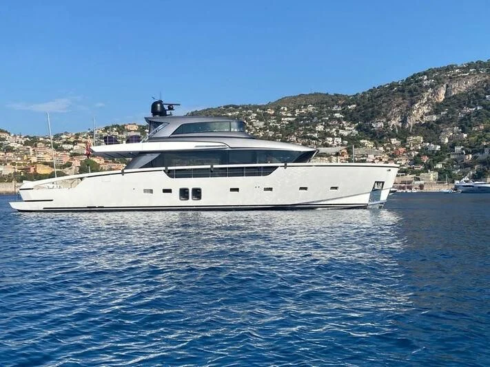 a white yacht in the water aboard DRAGONFLY I Yacht for Sale
