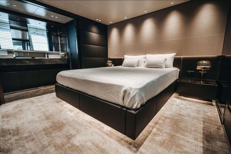 a bed in a room aboard DRAGONFLY I Yacht for Sale