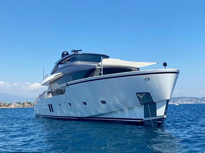 a white yacht in the water aboard DRAGONFLY I Yacht for Sale