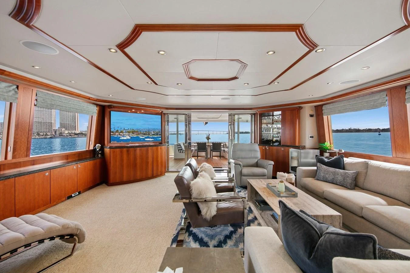 a living room with a large window aboard DESPERADO Yacht for Sale