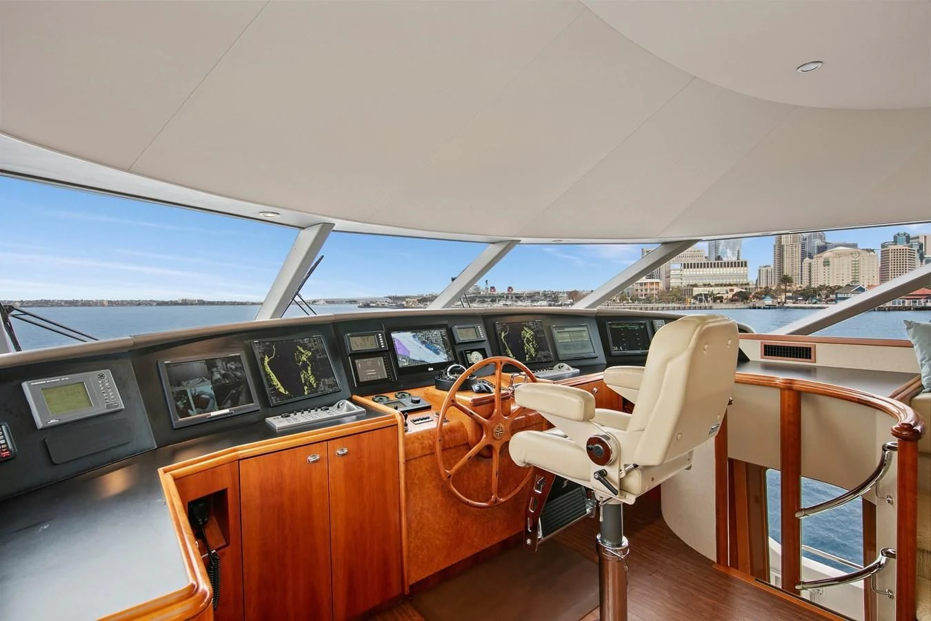 a room with a desk and chairs aboard DESPERADO Yacht for Sale