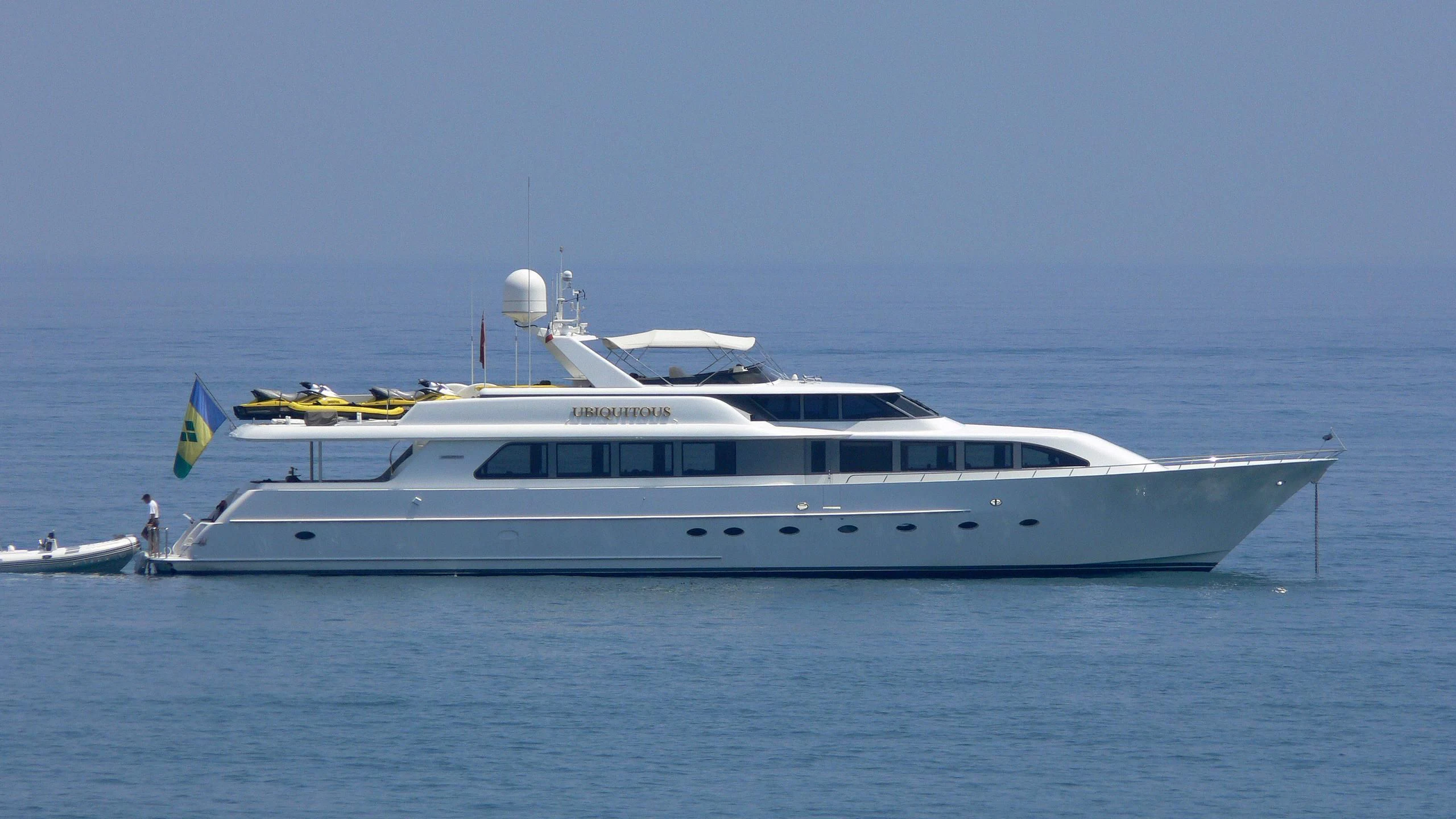a white yacht in the water aboard THE JOB Yacht for Sale