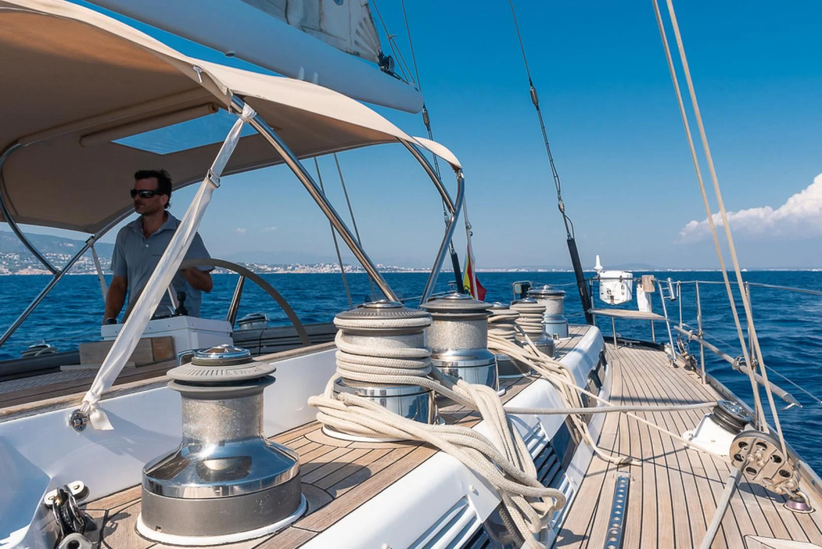 a person sitting on a boat aboard CRYSTAL Yacht for Sale