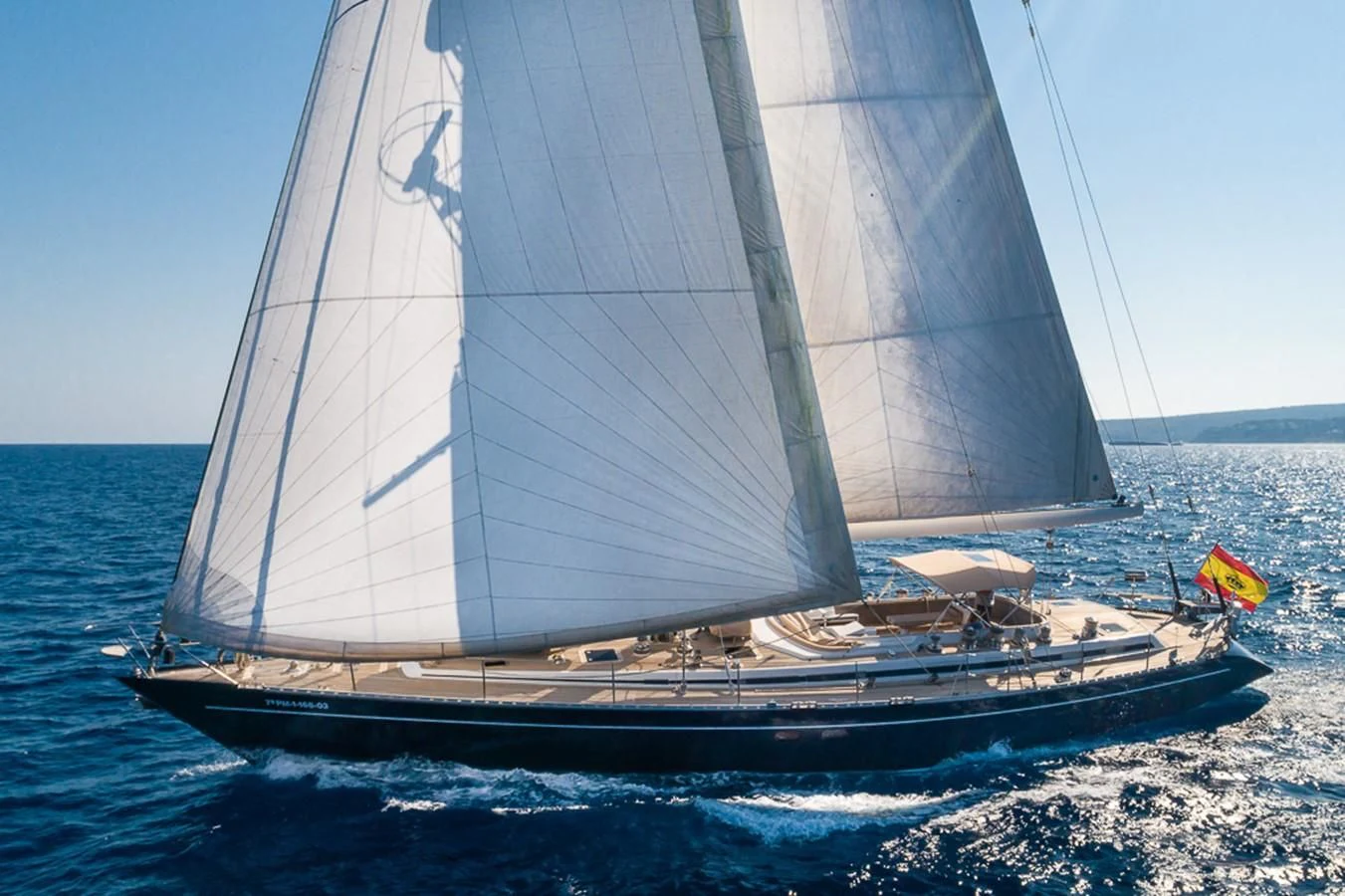 a sailboat on the beach aboard CRYSTAL Yacht for Sale