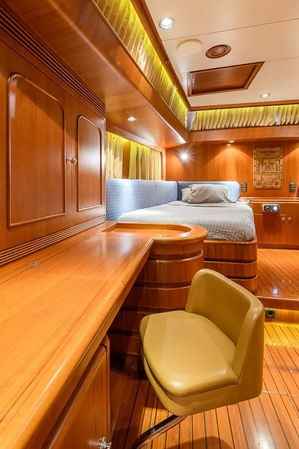 a living room with a couch and a table aboard CRYSTAL Yacht for Sale