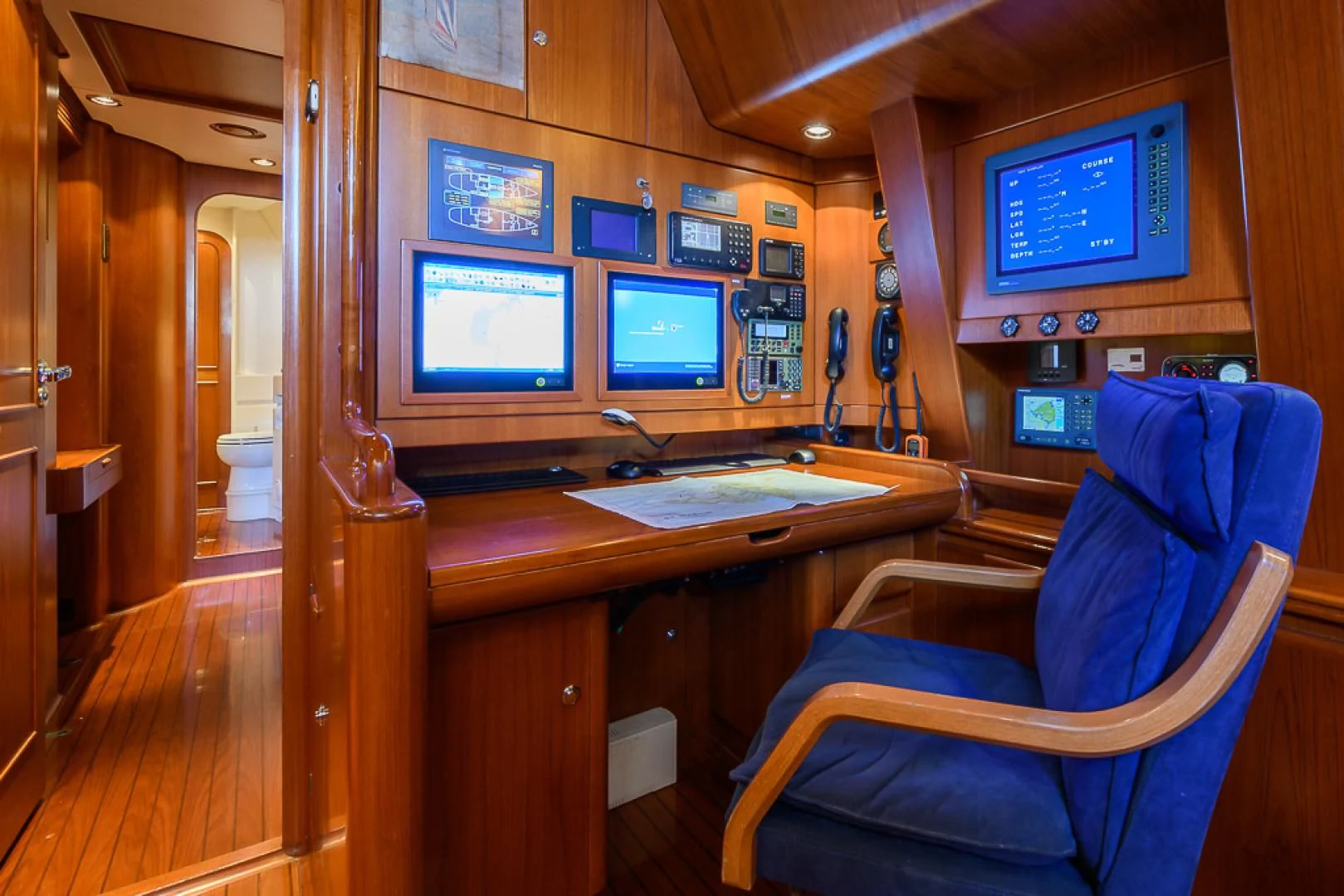 a room with a desk and chairs aboard CRYSTAL Yacht for Sale
