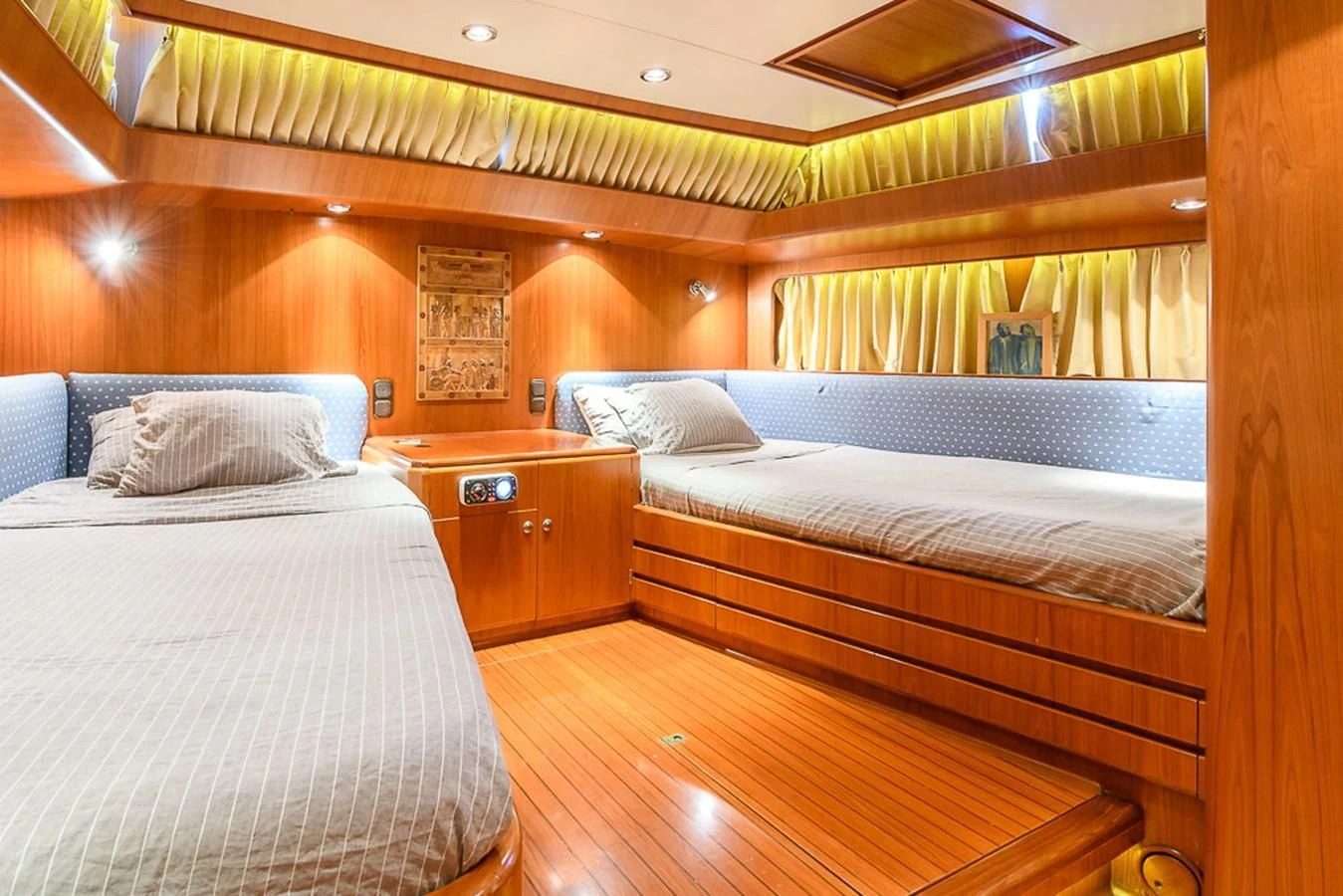 a room with two beds aboard CRYSTAL Yacht for Sale