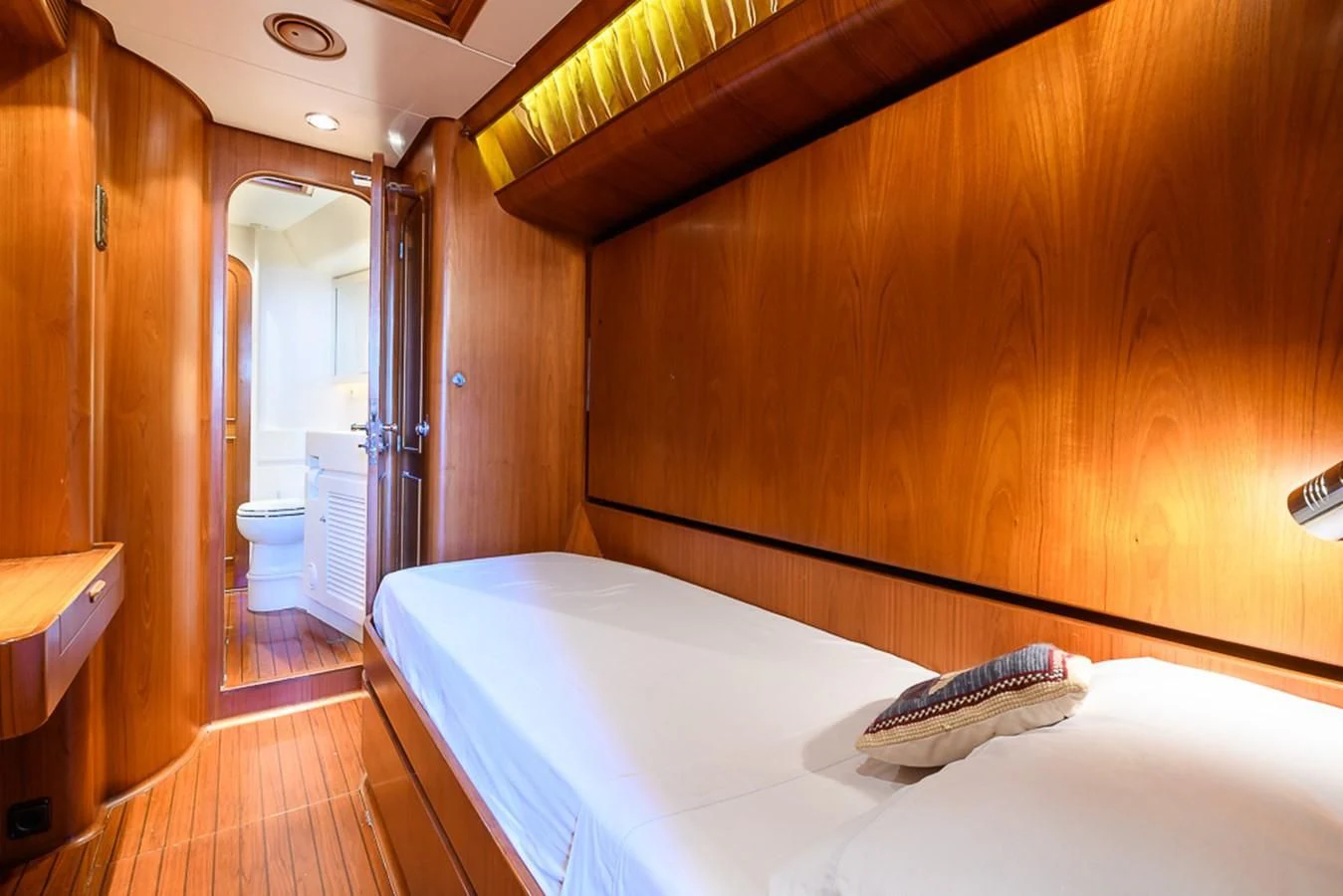 a bed in a room aboard CRYSTAL Yacht for Sale
