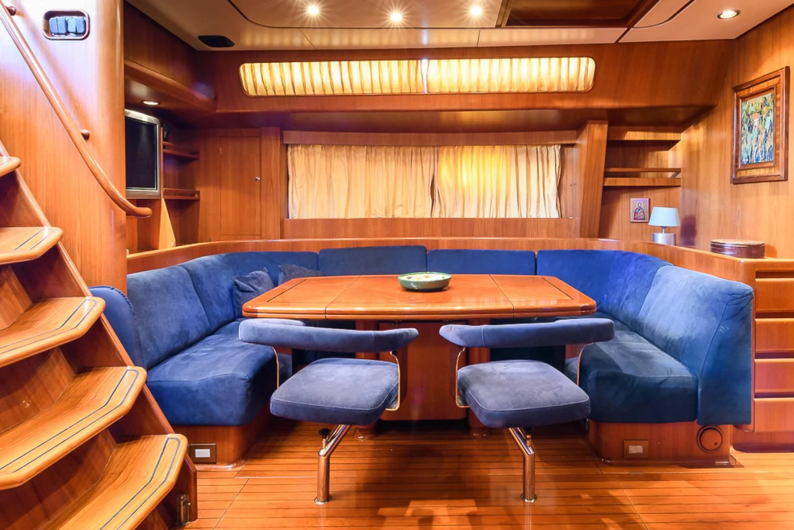 a room with a couch and a table aboard CRYSTAL Yacht for Sale