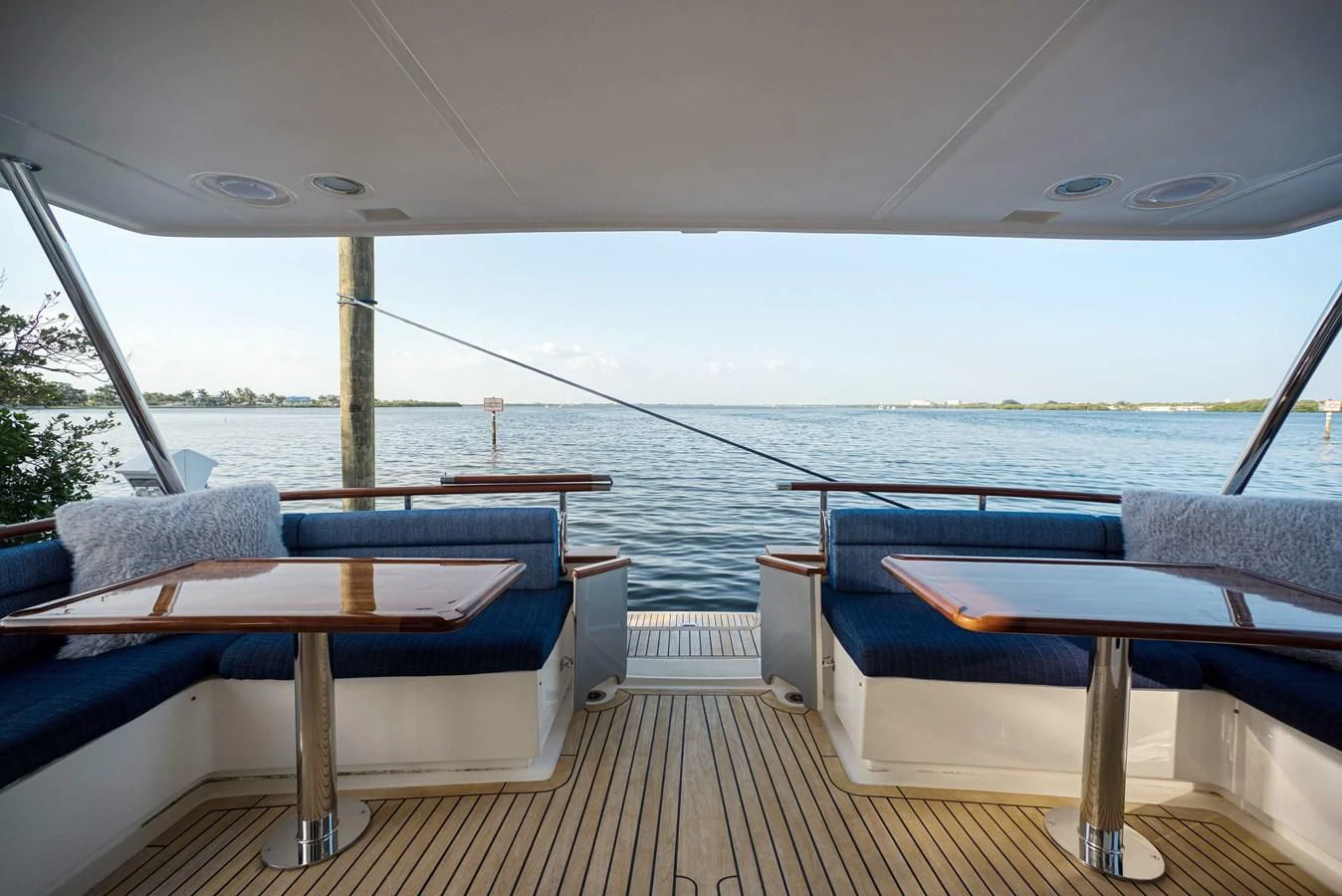 a deck with a view of the ocean and a deck aboard MAGIC Yacht for Sale