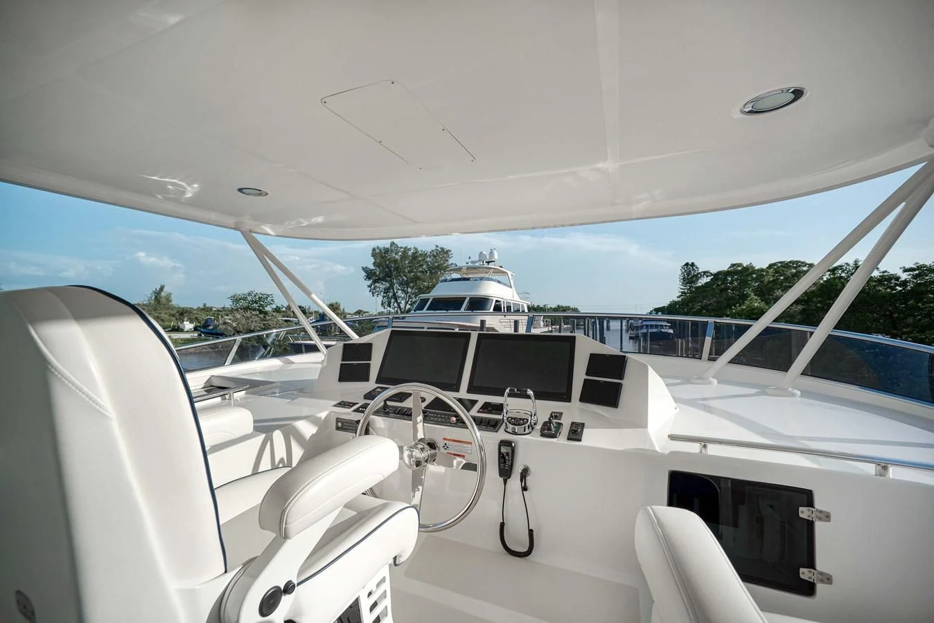 the inside of a white car aboard MAGIC Yacht for Sale