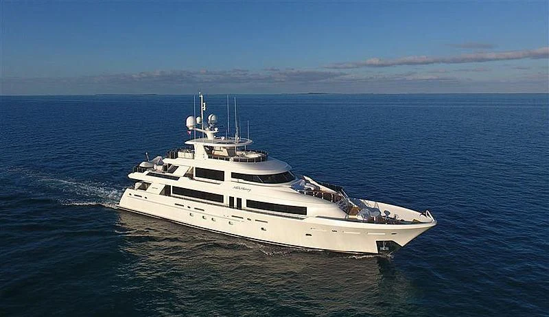 a white boat in the water aboard BLUE TIME Yacht for Sale