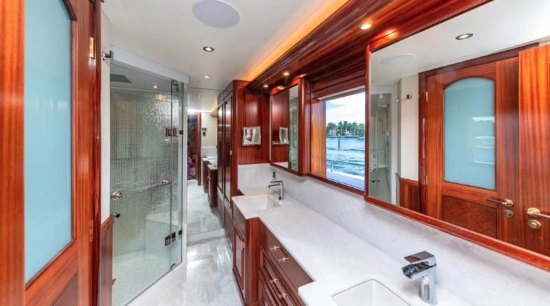a bathroom with a countertop sink and cabinets aboard BLUE TIME Yacht for Sale