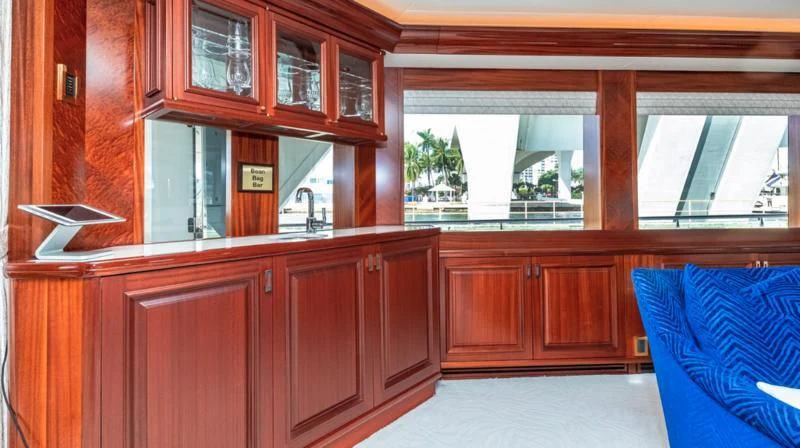 a room with wooden cabinets aboard BLUE TIME Yacht for Sale