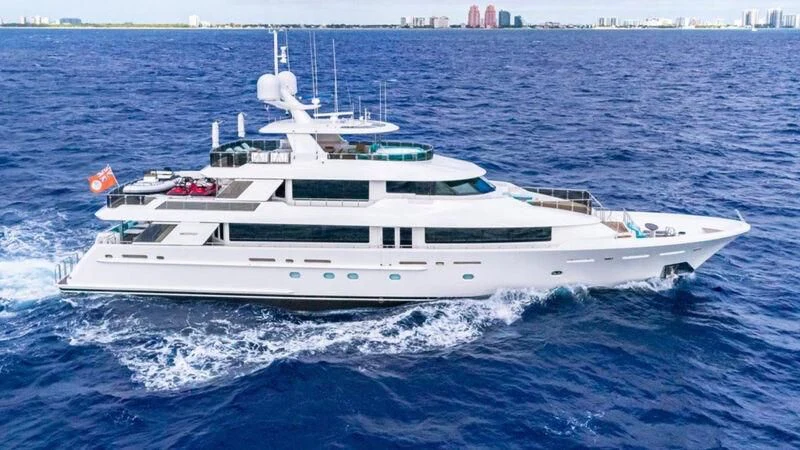 a white yacht on the water aboard BLUE TIME Yacht for Sale