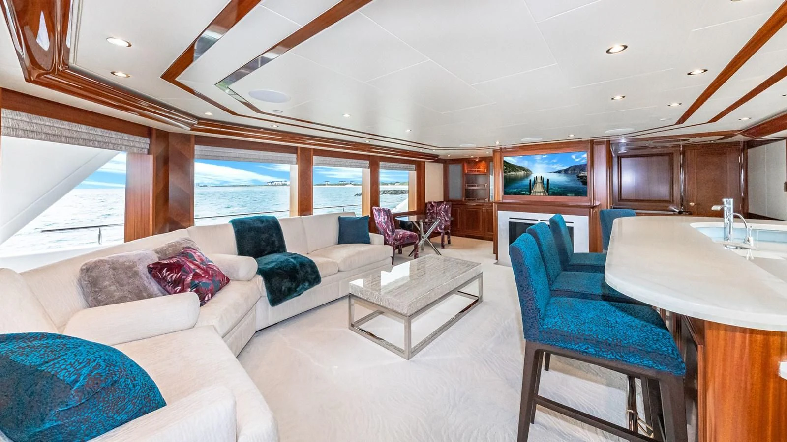 a living room with a large open window aboard BLUE TIME Yacht for Sale