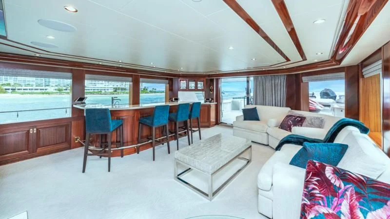 a living room with a couch and a table aboard BLUE TIME Yacht for Sale