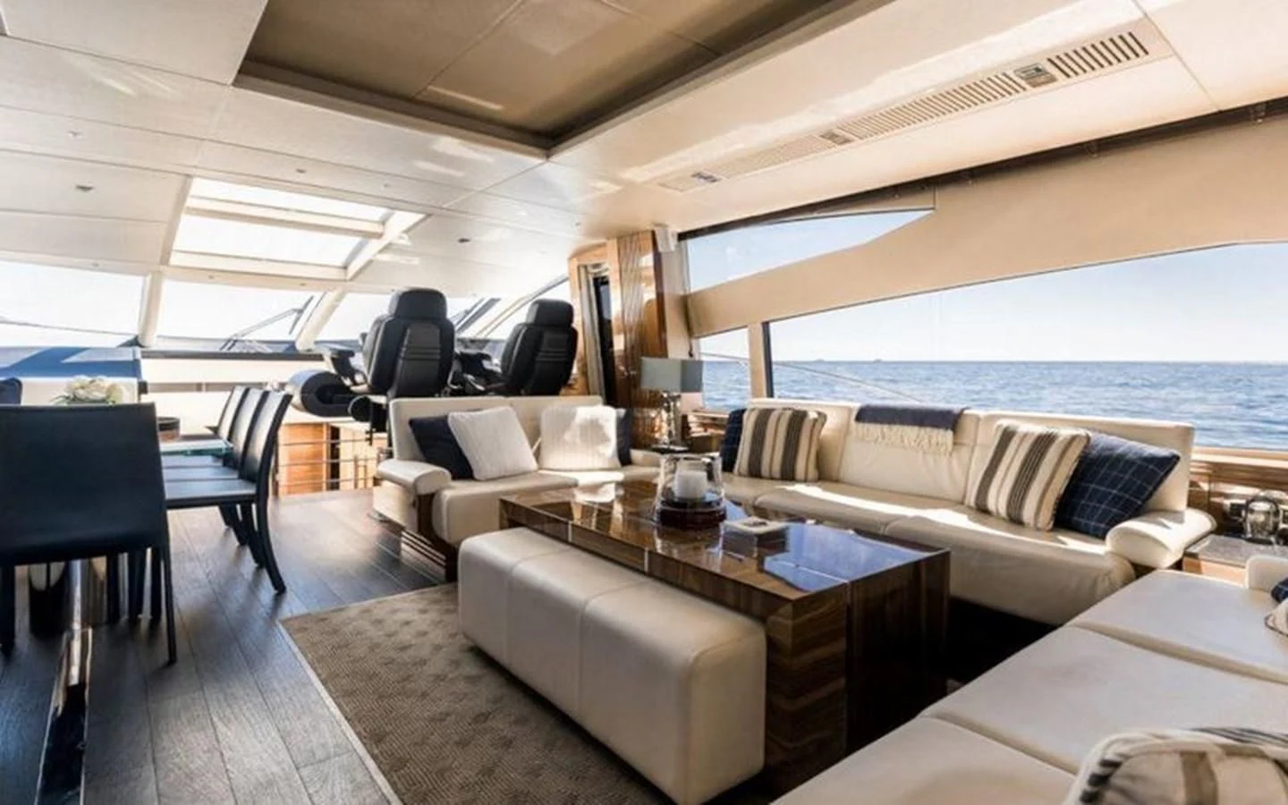 a living room with a large window aboard YINWA Yacht for Sale