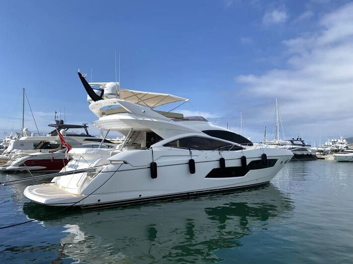 a white yacht in the water aboard YINWA Yacht for Sale