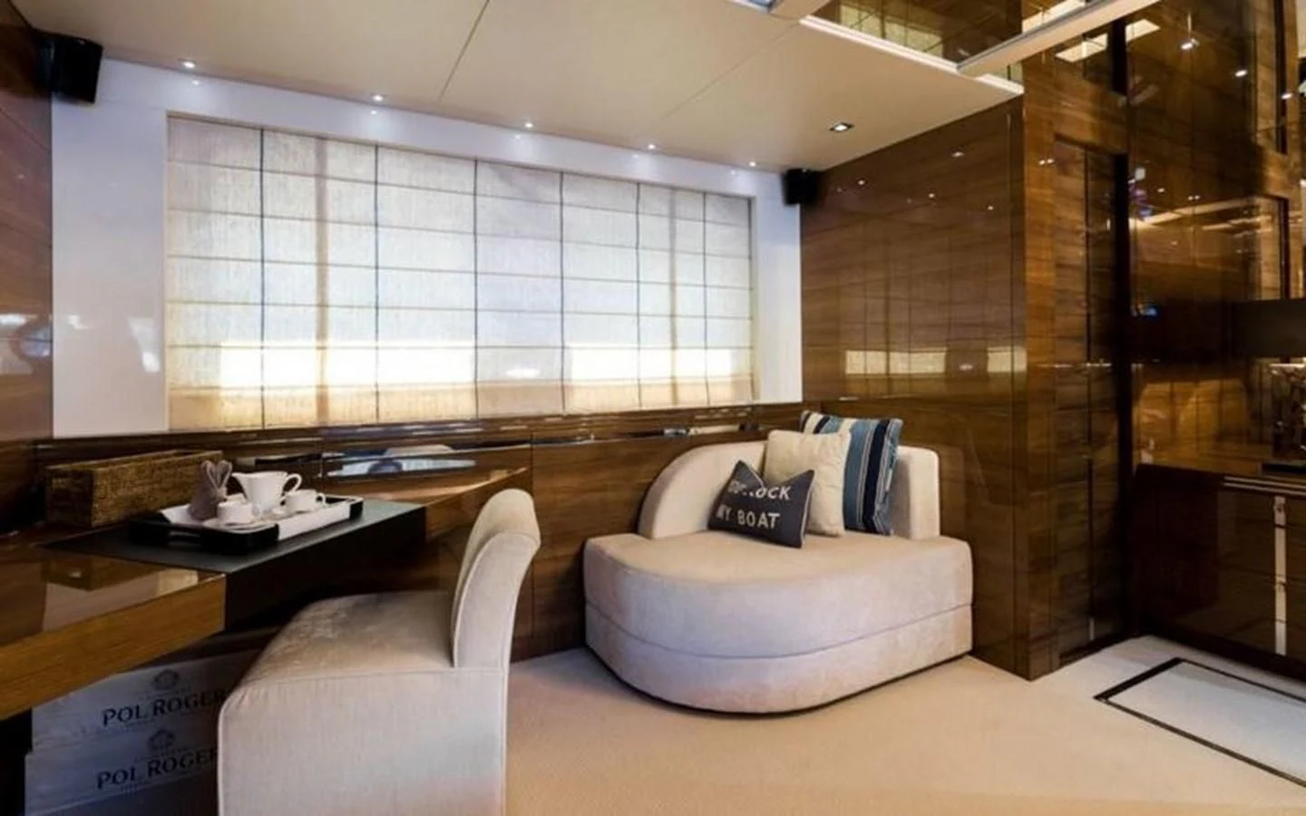 a room with a couch and a table aboard YINWA Yacht for Sale