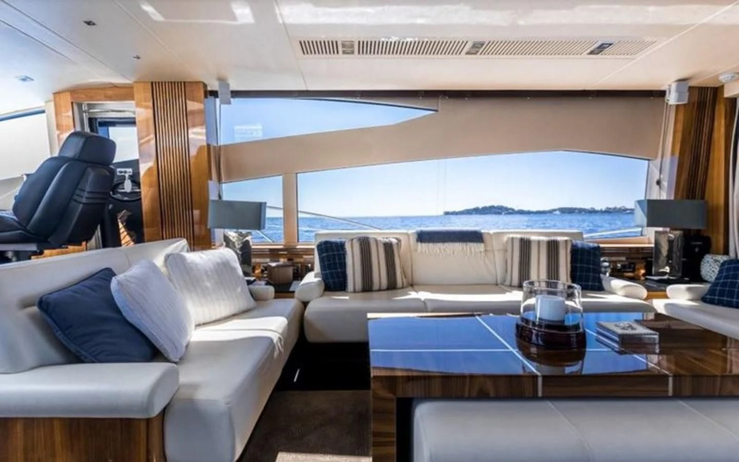 a living room with a large window aboard YINWA Yacht for Sale