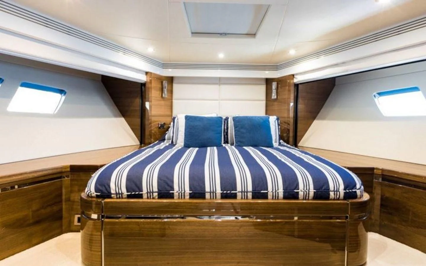a bed in a room aboard YINWA Yacht for Sale