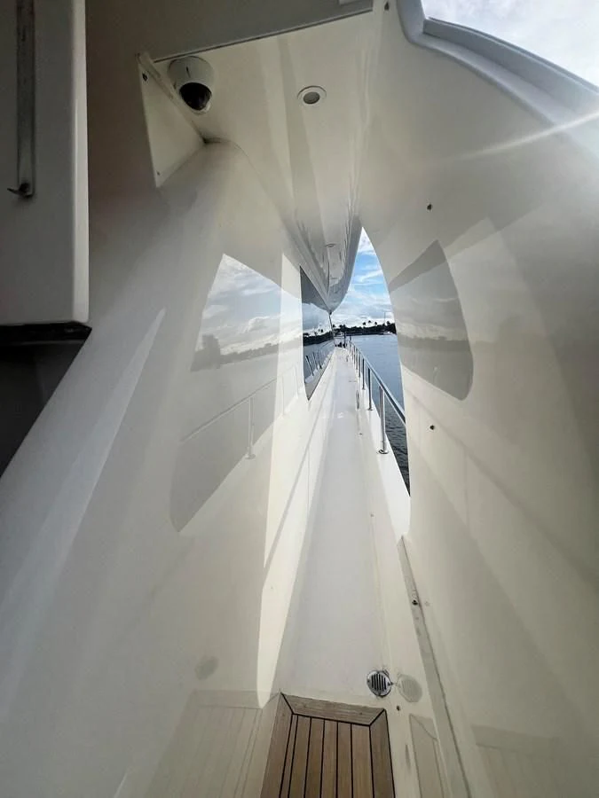a white staircase with a white railing aboard ROXY MARIA Yacht for Sale