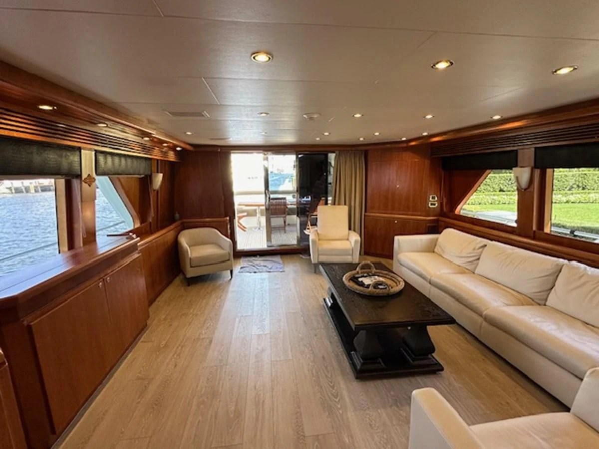 a living room with a wood floor aboard ROXY MARIA Yacht for Sale