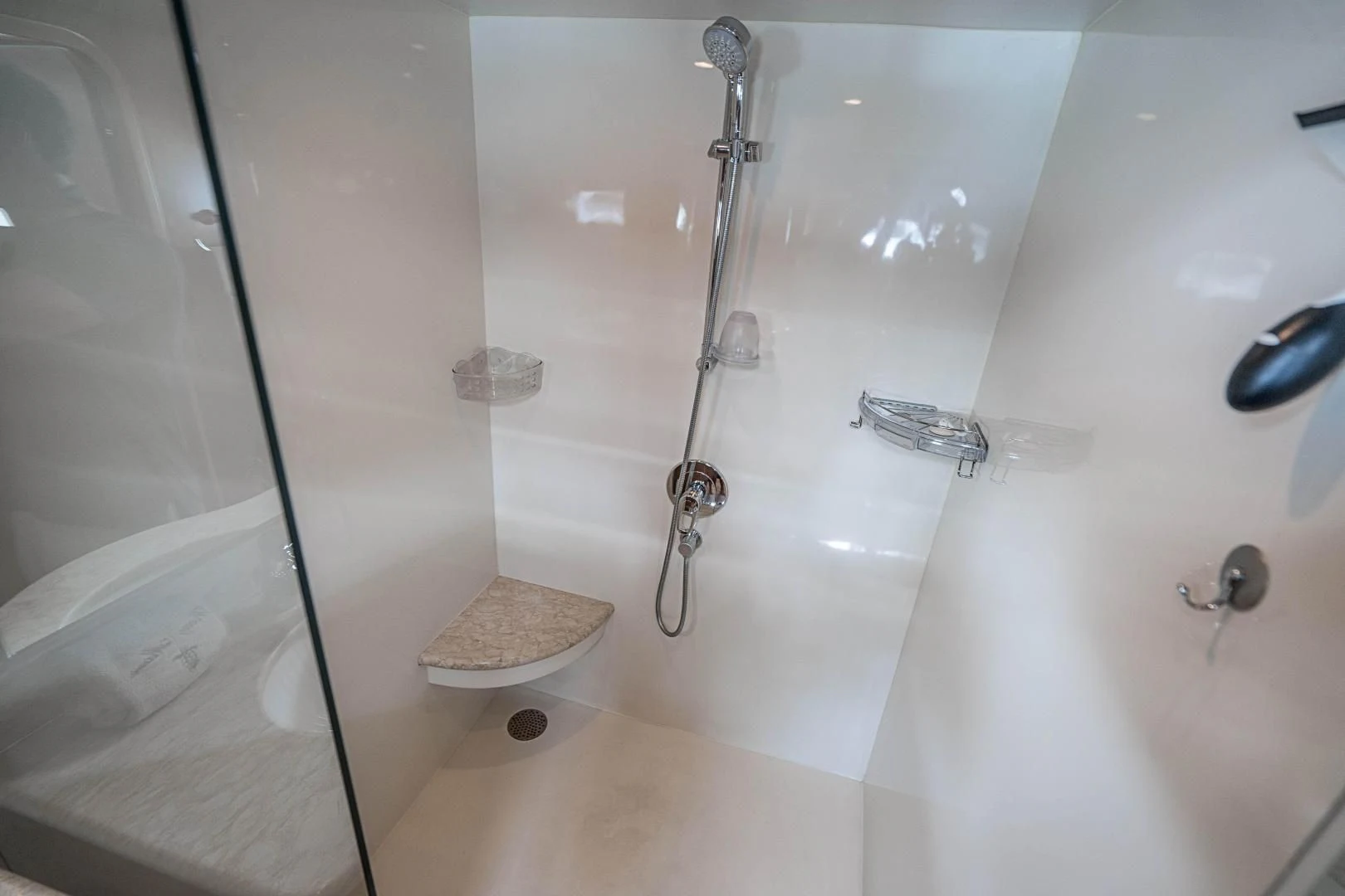 a bathroom with a shower and a sink aboard ROXY MARIA Yacht for Sale