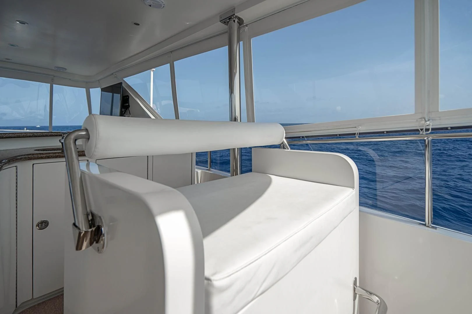 a white boat with a blue sky aboard ROXY MARIA Yacht for Sale