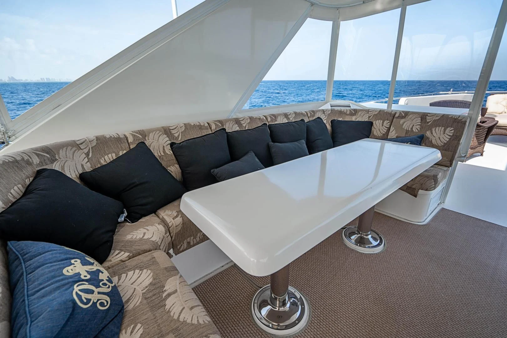 a white table on a boat aboard ROXY MARIA Yacht for Sale