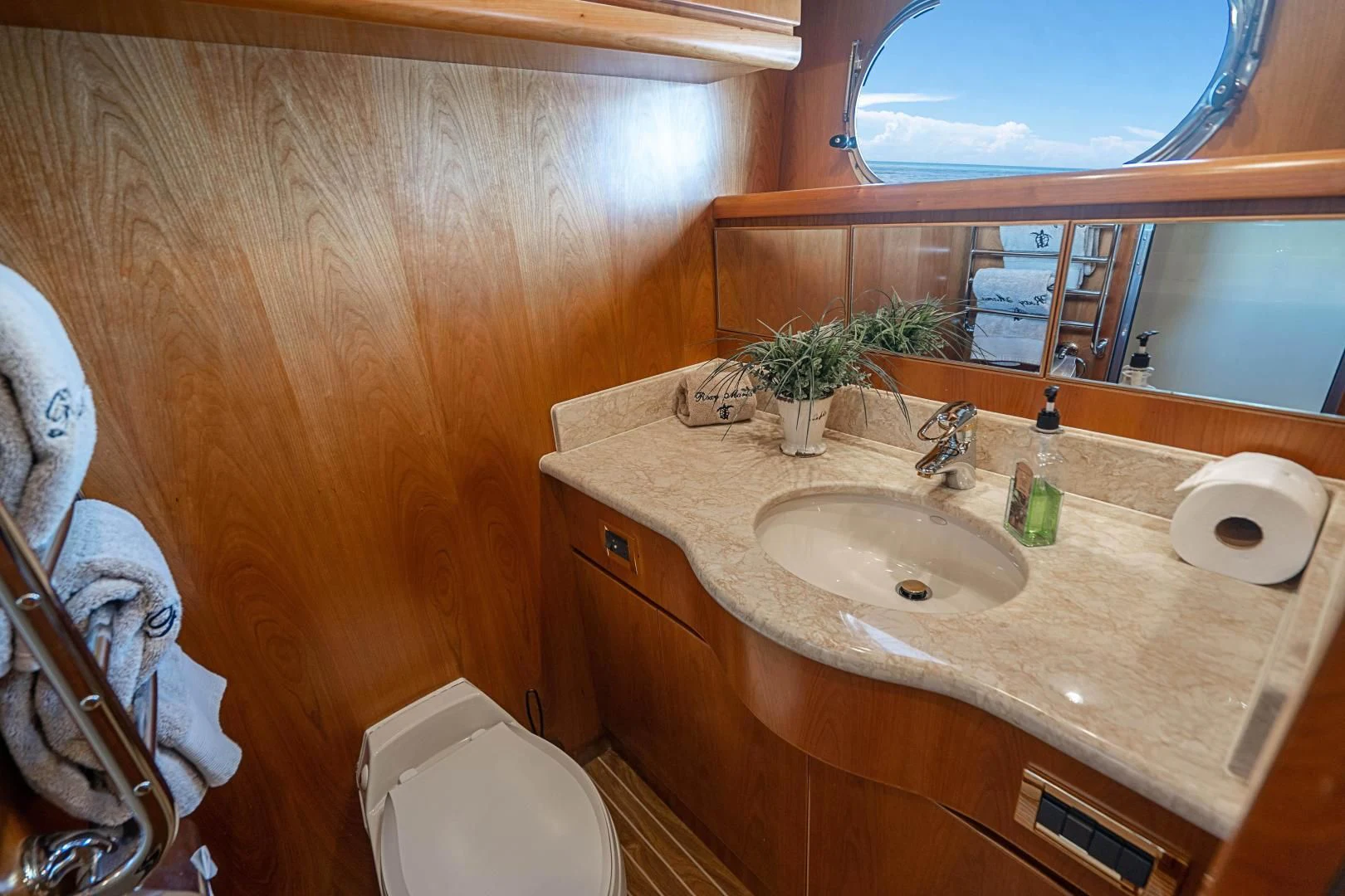 a bathroom with a sink and toilet aboard ROXY MARIA Yacht for Sale