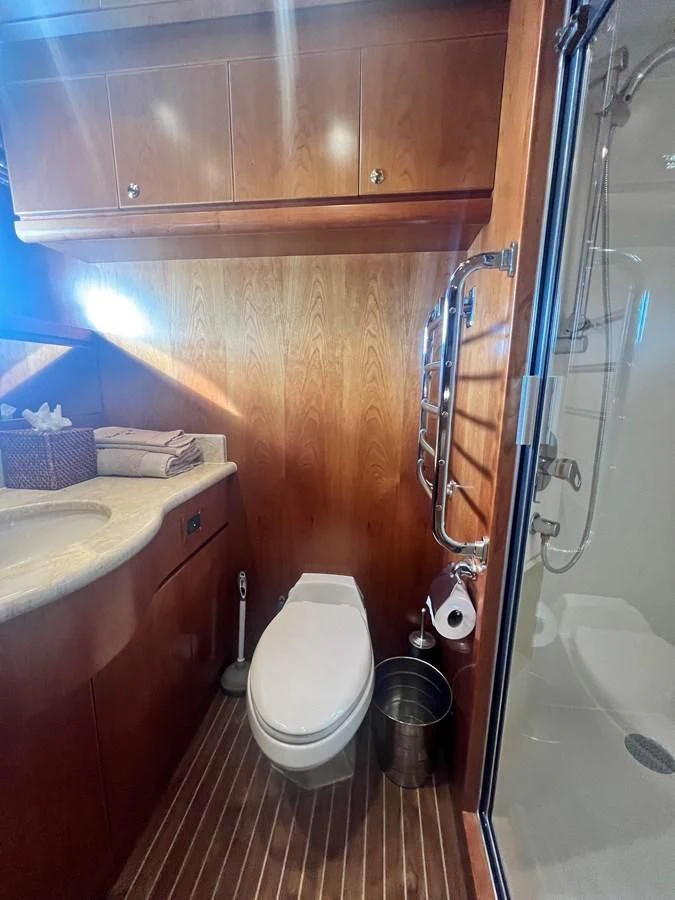 a bathroom with a toilet and sink aboard ROXY MARIA Yacht for Sale