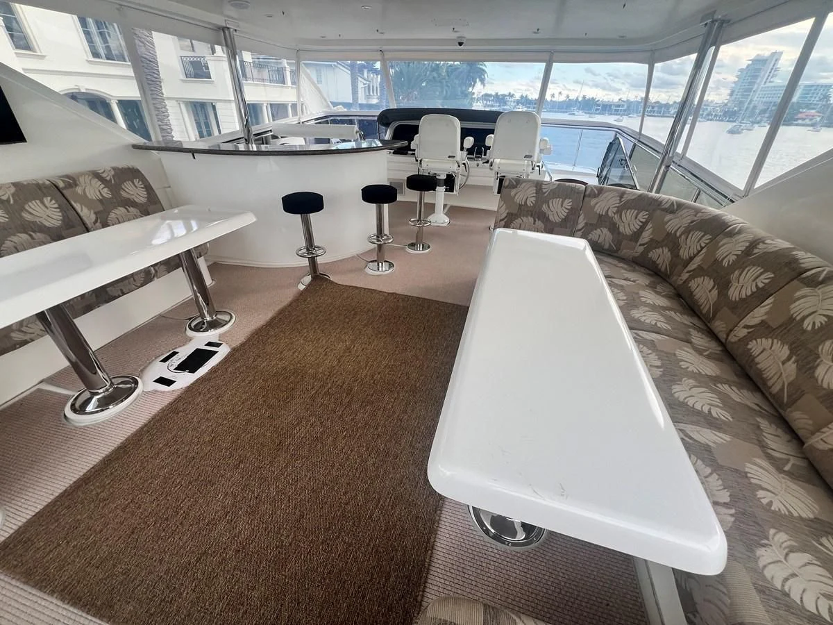 a room with a couch and chairs aboard ROXY MARIA Yacht for Sale